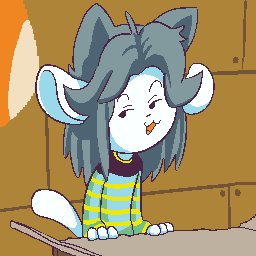 A cat–dog hybrid wearing a blue and yellow striped sweater in a wood shack sitting in front of a cardboard box, smiling with eyebrows raised.